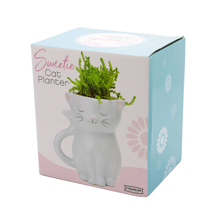 Sweetie Cat Planter Features: Planter contains a drainage hole Material: Ceramic Packaging: Color Box