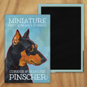 Behold our classic Min Pin Magnet, meticulously reproduced from an original oil painting by the renowned artist Ursula Dodge. This exquisite 2