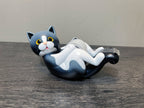 Purrfectly playful, this frisky feline is ready to play and is hardly stationary at all! There's always room for a kitty on your desktop, this one holds tape! Material: Polyresin, Metal, ABS Packaging: Color Box